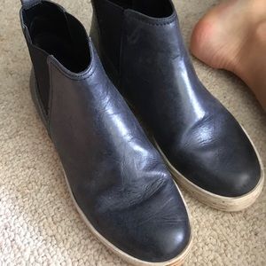 Black hightop sneakers